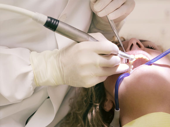 wearing the Non-Sterile Latex Examination Gloves