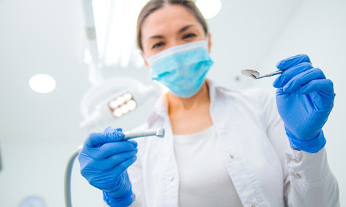 Dentist wearing gloves