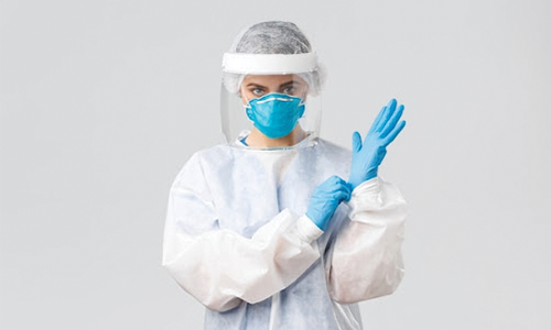 Female doctor in PPE Kit