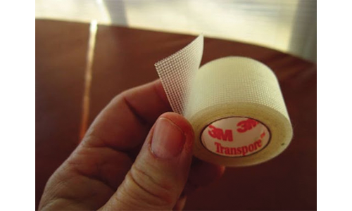 Hand Holding Transpore Medical Tape