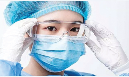 nurse wears a medical goggle