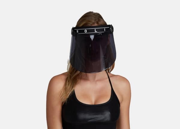 Woman Putting on Noli Face Shield