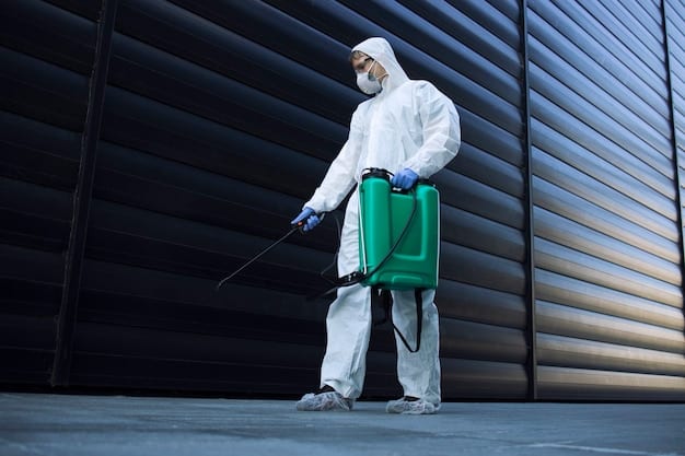 Person in white chemical protection suit